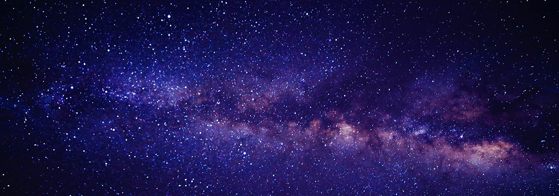 Outer-space image colored purple and pink