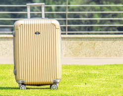 Yellow wheelie suitcase