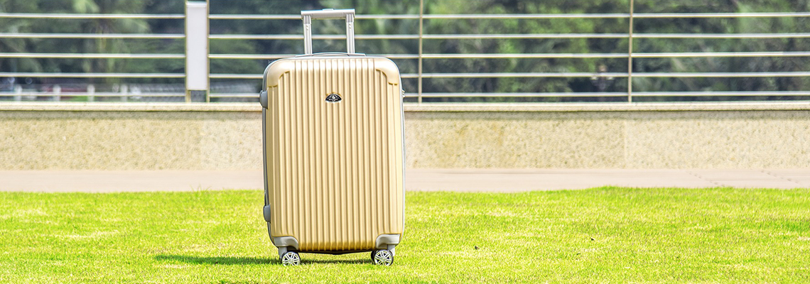 Yellow wheelie suitcase