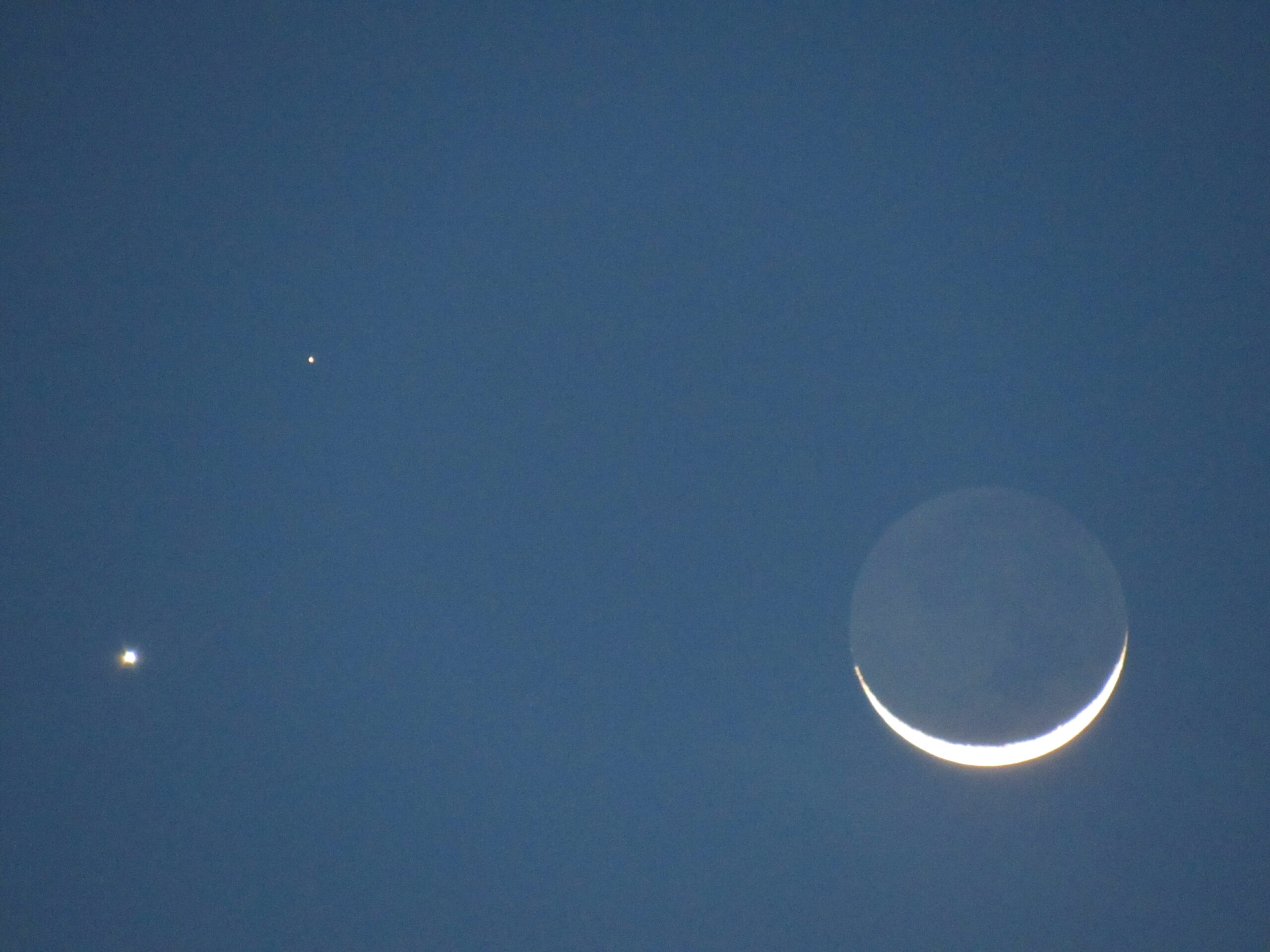 A photograph of the new moon by James Havard, via Creative Commons