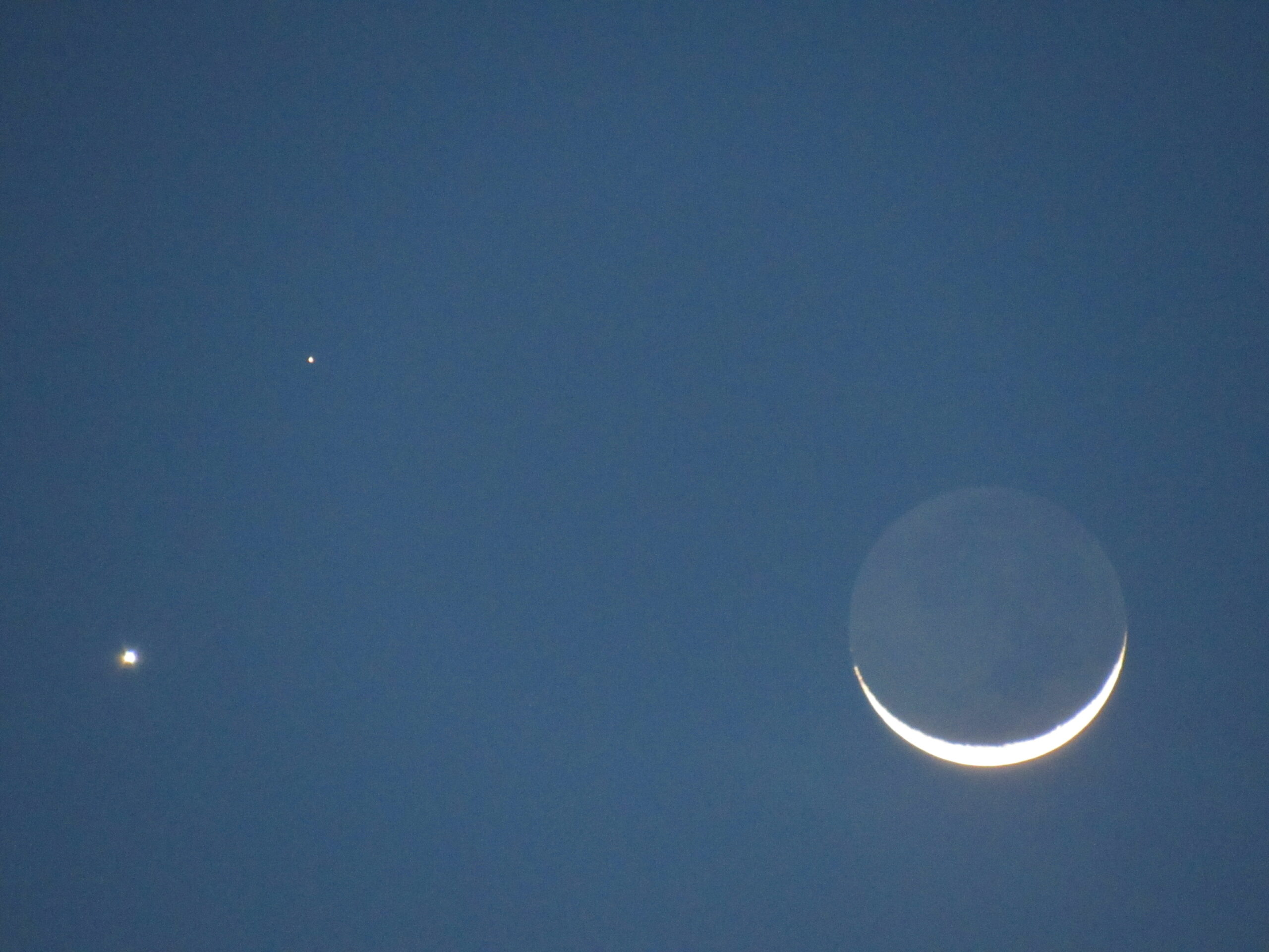 A photograph of the new moon by James Havard, via Creative Commons